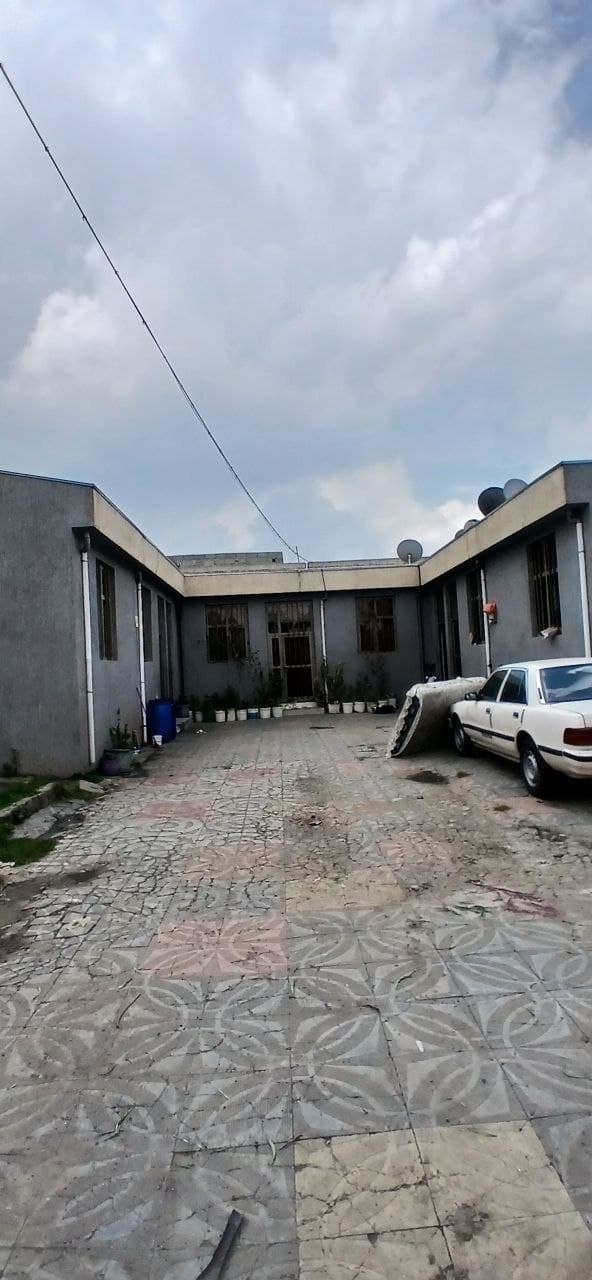 Modern L-Shape House in Meri — 1